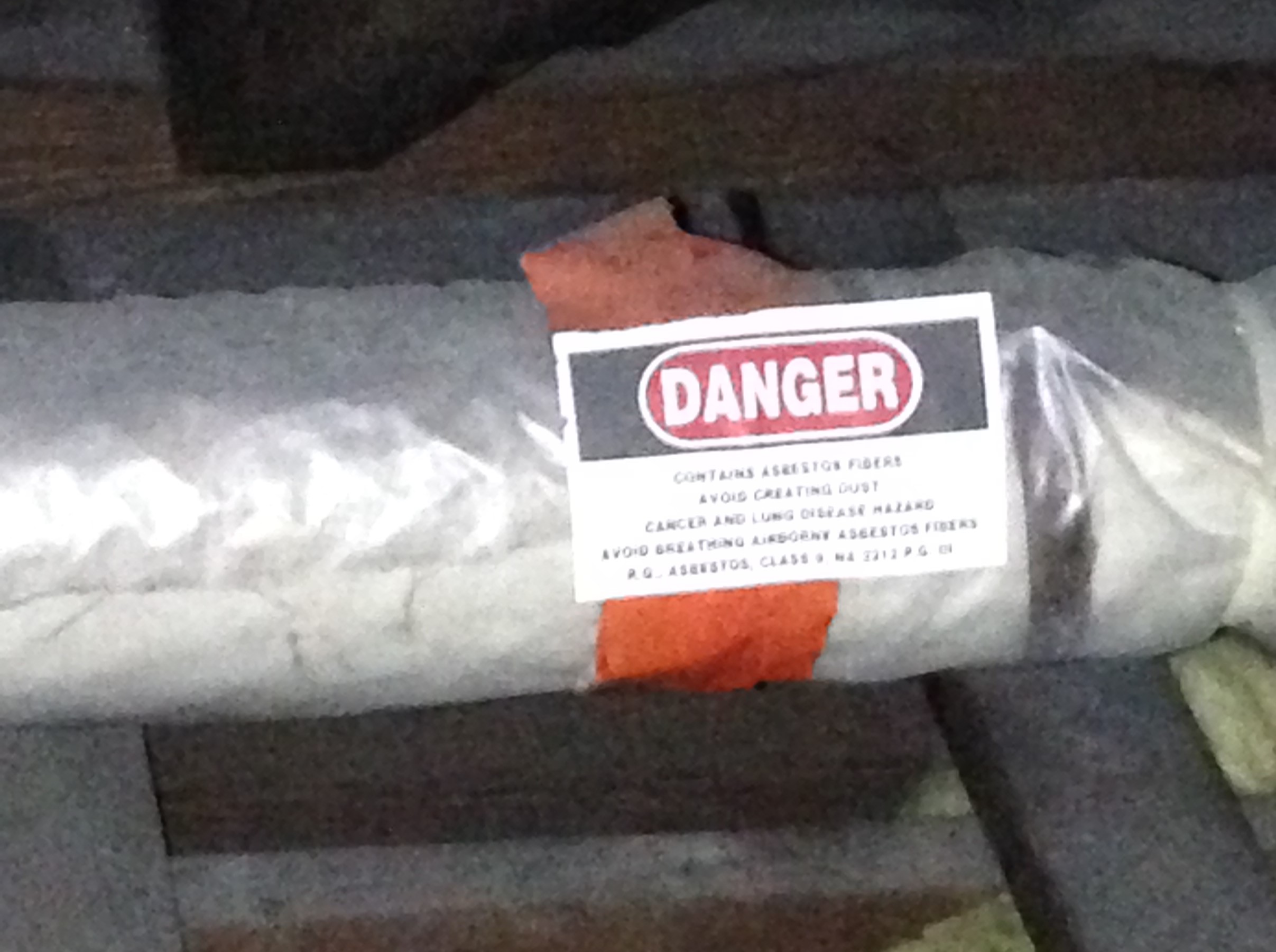 Pipe insulated with Asbestos-Containing Material 
